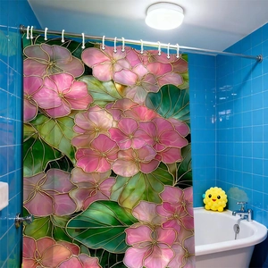 Floral shower curtain with pink flowers and green leaves in a bright bathroom setting