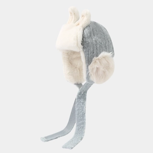 Detail view of the winter child hat featuring cute bunny ears and thick plush lining texture