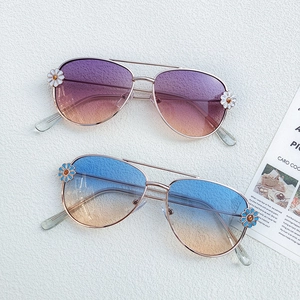 Kids' metal flower sunglasses with daisy charms and stylish gradient colored lenses