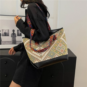 Ethnic style large canvas tote bag with geometric woven patterns and leather trim