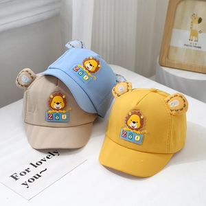 Cute cartoon lion baby baseball caps with 3D ears in blue, beige, and yellow colors
