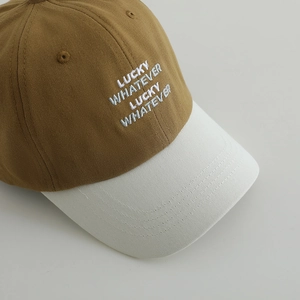 Kids baseball cap featuring Lucky Whatever embroidery and a two-tone color block design