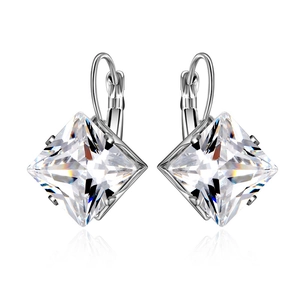 Macro shot of lever-back earrings with princess cut cubic zirconia stones in silver finish
