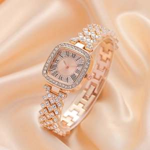 Rose gold square women's watch with rhinestone-studded metal link strap on silk