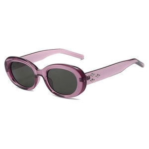 Retro oval sunglasses in transparent purple frame with star accents on the temples