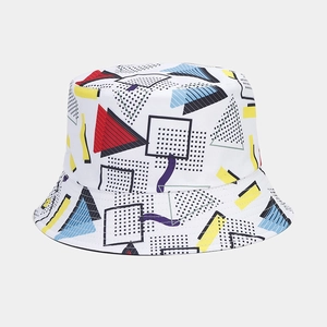 Macro detail of 3D geometric pattern print on white reversible bucket hat canvas fabric