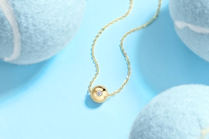 Detailed view of s925 silver moissanite teardrop pendant necklace with golden finish