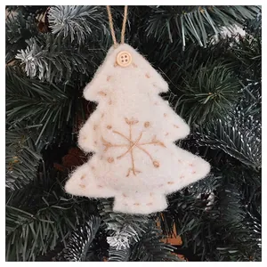 Handmade white wool felt Christmas tree ornament with snowflake embroidery and wooden button