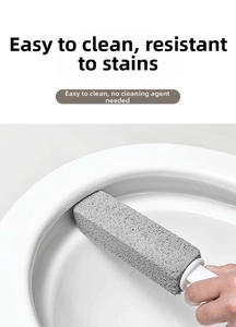 Macro view of pumice toilet cleaning wand removing stubborn stains from ceramic surface