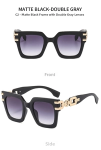 Detail view of matte black sunglasses with gold metal chain temples and gray gradient lenses