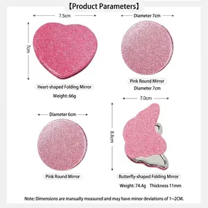 Pink glitter folding makeup mirrors in heart, round and butterfly shapes on white background