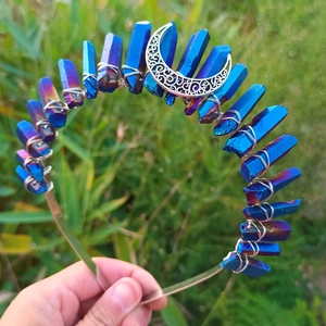 Detail of wicca crown with blue purple gradient crystal and metal moon ornament