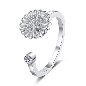 Adjustable silver daisy spinner ring with sparkling cubic zirconia flower petals