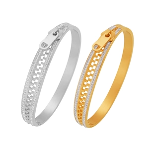 Minimalist 18k gold and silver zipper-shaped bangle set with sparkling crystal pavé