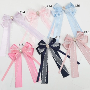 Girls' ribbon bow hair clips with pearls in multiple colors like pink and blue