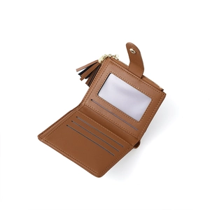 Brown leather wallet interior view showing card slots, photo window and zipper pouch
