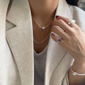 Elegant 925 sterling silver set featuring minimalist irregular open rings and sleek chains