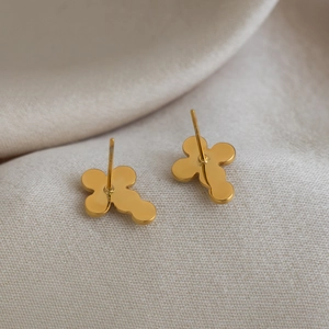 Polished 18K gold plated stainless steel cross stud earrings with cubic zirconia