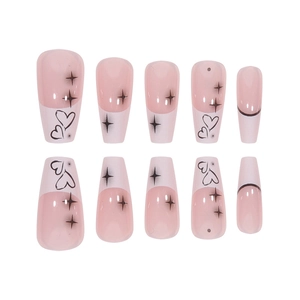 French tip coffin press-on nails with pink base, black hearts, and star designs