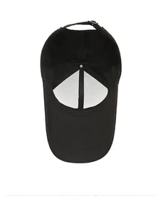 Detailed interior view of a black baseball cap featuring an adjustable metal buckle strap