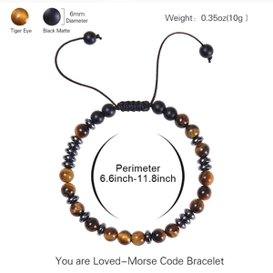Tiger Eye and Black Matte Morse Code bracelet with adjustable cord on white background