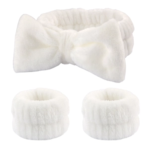 Detail of soft white flannel headband and wristbands set for face washing and skincare