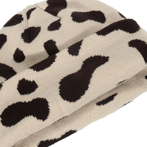 Winter knitted beanie with cow pattern jacquard and rolled cuff design for women