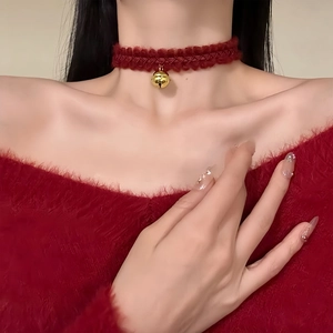 Retro red knitted choker necklace with a gold bell pendant for women stylish jewelry