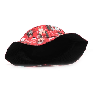 Detail of Christmas bucket hat featuring festive patterns with Santa Claus and reindeer motifs
