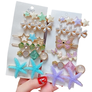 8-piece set of colorful resin pearl hair clips featuring stars, flowers and butterflies