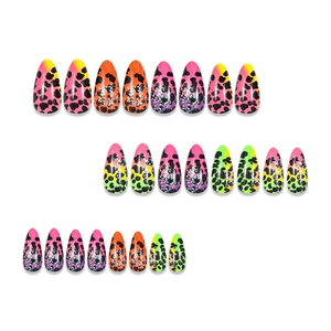Detailed view of leopard print long press-on nails with glitter and colorful gradients