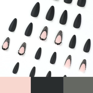 Matte black and pink french tip press-on nails with rhinestones in almond shape