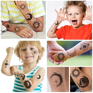 Waterproof sun and moon temporary tattoos for kids with black and white star patterns