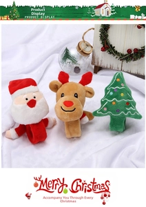 Detail view of plush Santa and Reindeer slap bracelets with festive holiday decorations