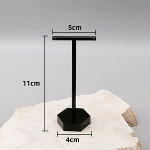Black T-shape acrylic earring stand display with hexagonal base for jewelry storage