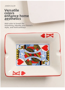 Close-up of rectangle ceramic ashtray with King of Hearts poker pattern and red trim