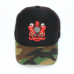 Detail of truck hat with lion dance embroidery, mesh back, and camo pattern brim