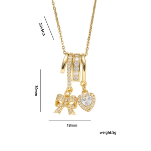 Goldene Halskette mit Schleifen- und Herzanhänger, Zirkonia-Besatz und 20+5cm Kette