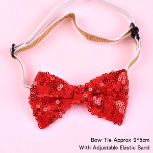 Detail of red sequined pet bow tie with adjustable elastic strap and 9x5cm size label