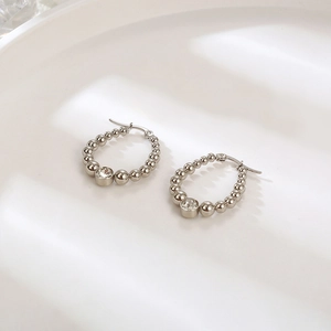 French vintage silver titanium steel bead hoop earrings with a single clear crystal pendant