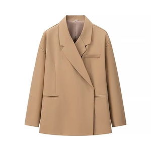 Detailed flat lay of khaki notched lapel blazer featuring side pockets and sharp tailoring