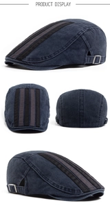 Detail view of washed cotton vintage flat cap with striped splicing and metal buckle