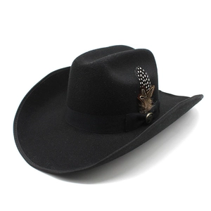 Detailed close-up of a black wool felt cowboy hat with natural feathers and metal buckle