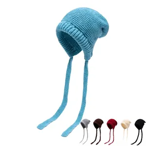 Hemelblauwe gebreide muts met oorkleppen, lange vlechten en diverse kleuropties voor dames