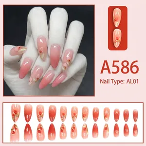 Pink gradient almond press-on nails with delicate cherry blossom floral patterns