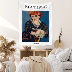 Detailed close-up of Matisse art tapestry in a cozy bedroom with natural window light