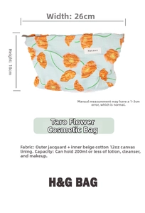 Detail of floral lily canvas makeup bag showing dimensions 26x18cm and jacquard fabric
