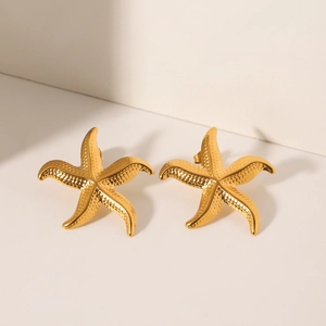 Boucles d'oreilles étoiles de mer en acier inoxydable doré au design marin texturé