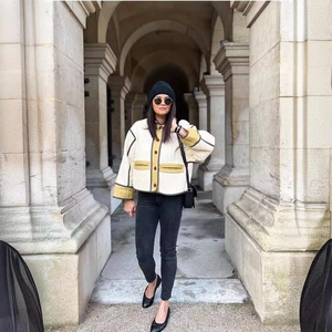 Short quilted jacket for women with contrast mustard yellow piping and diamond pattern