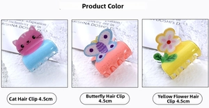 Dettaglio delle mini mollette per capelli in acrilico glitterato da 4,5 cm con gatti e fiori